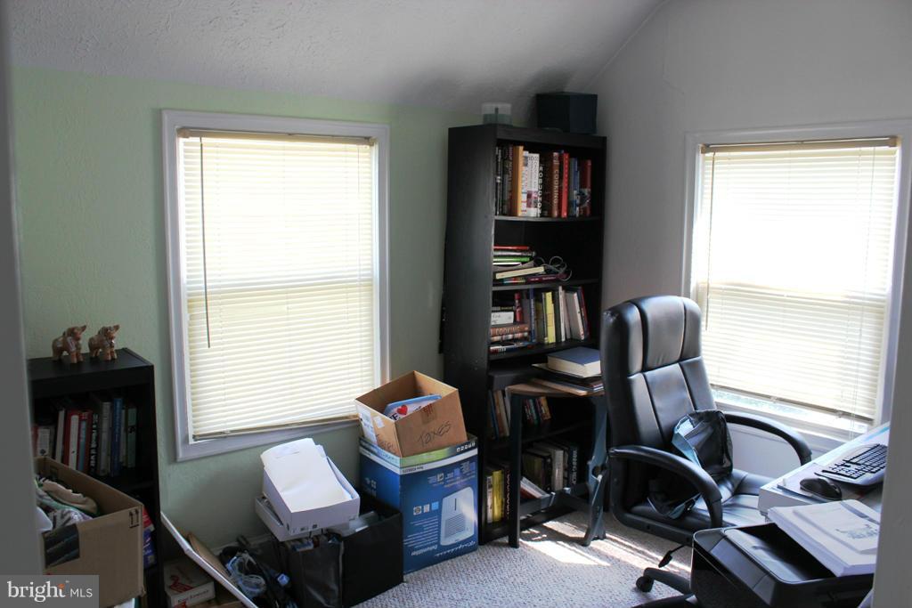 46695 Yorktown Road Lexington Park, MD 20653 - Photo 10 of 14 a view of a workspace with furniture and a window