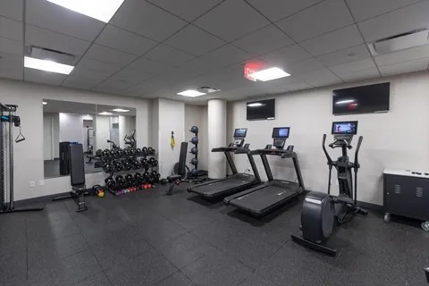 a view of a room with gym equipment