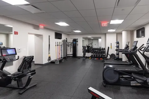 a view of a room with gym equipment