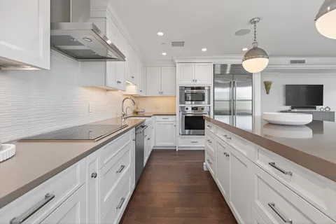 a large kitchen with cabinets