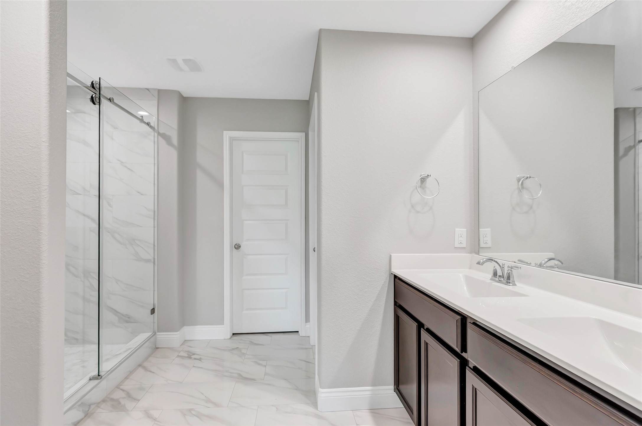 214 Kickapoo Drive Anahuac, TX 77514 - Photo 25 of 36 a bathroom with a sink and a mirror