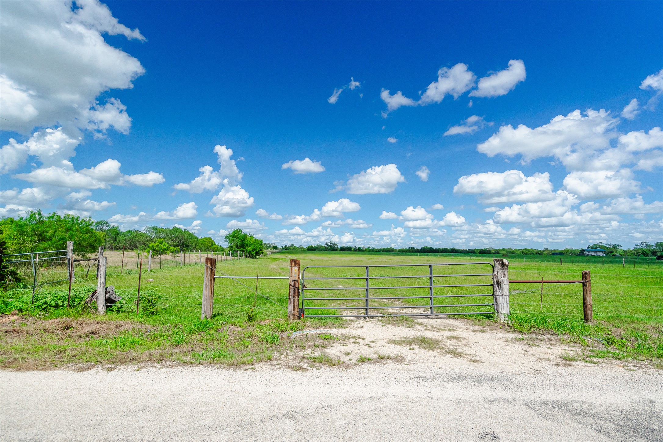 3109 Tenney Creek Road Dale, TX 78616 - Photo 6 of 23 Wire fence and entry gate. Cows are on property, please close the gate behind you.