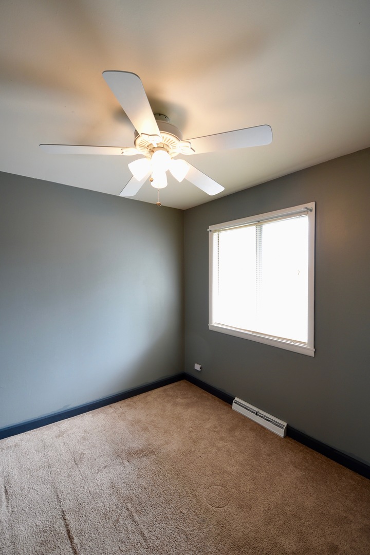 13 Tweed Road Fox Lake, IL 60020 - Photo 16 of 23 an empty room with a window