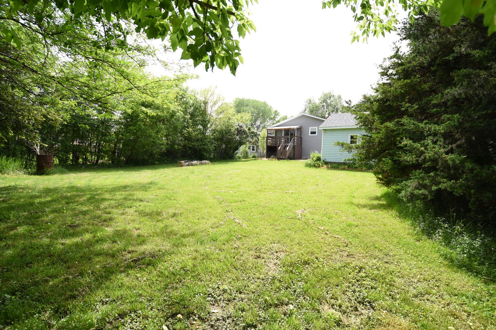 13 Tweed Road Fox Lake, IL 60020 - Photo 21 of 23 a house with a garden