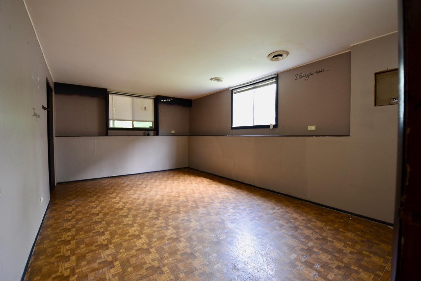 13 Tweed Road Fox Lake, IL 60020 - Photo 9 of 23 a view of an empty room with window and wooden floor