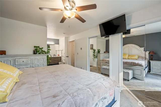 a bathroom with a double vanity sink and mirror
