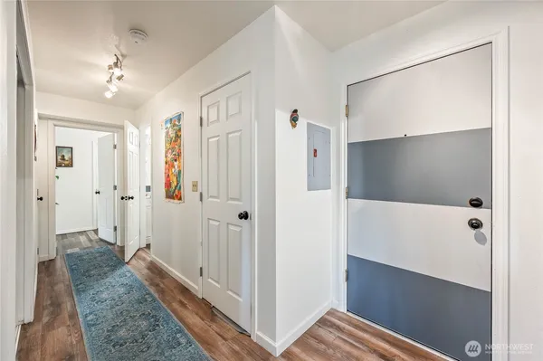 a living room with furniture and a table