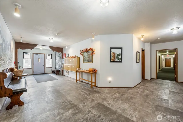 a room with furniture and pool table