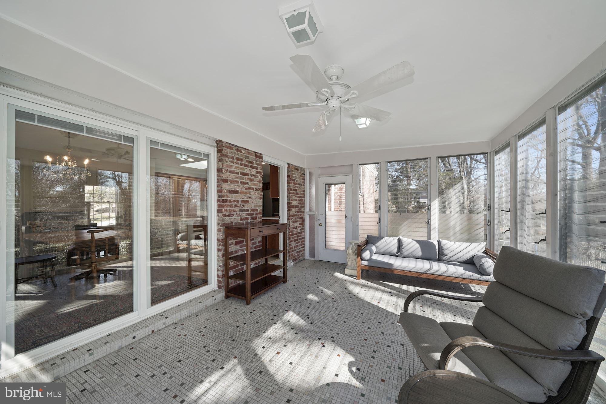9709 Byeforde Road Kensington, MD 20895 - Photo 12 of 35 3 Season Porch with Glass Sliders to Dining Room