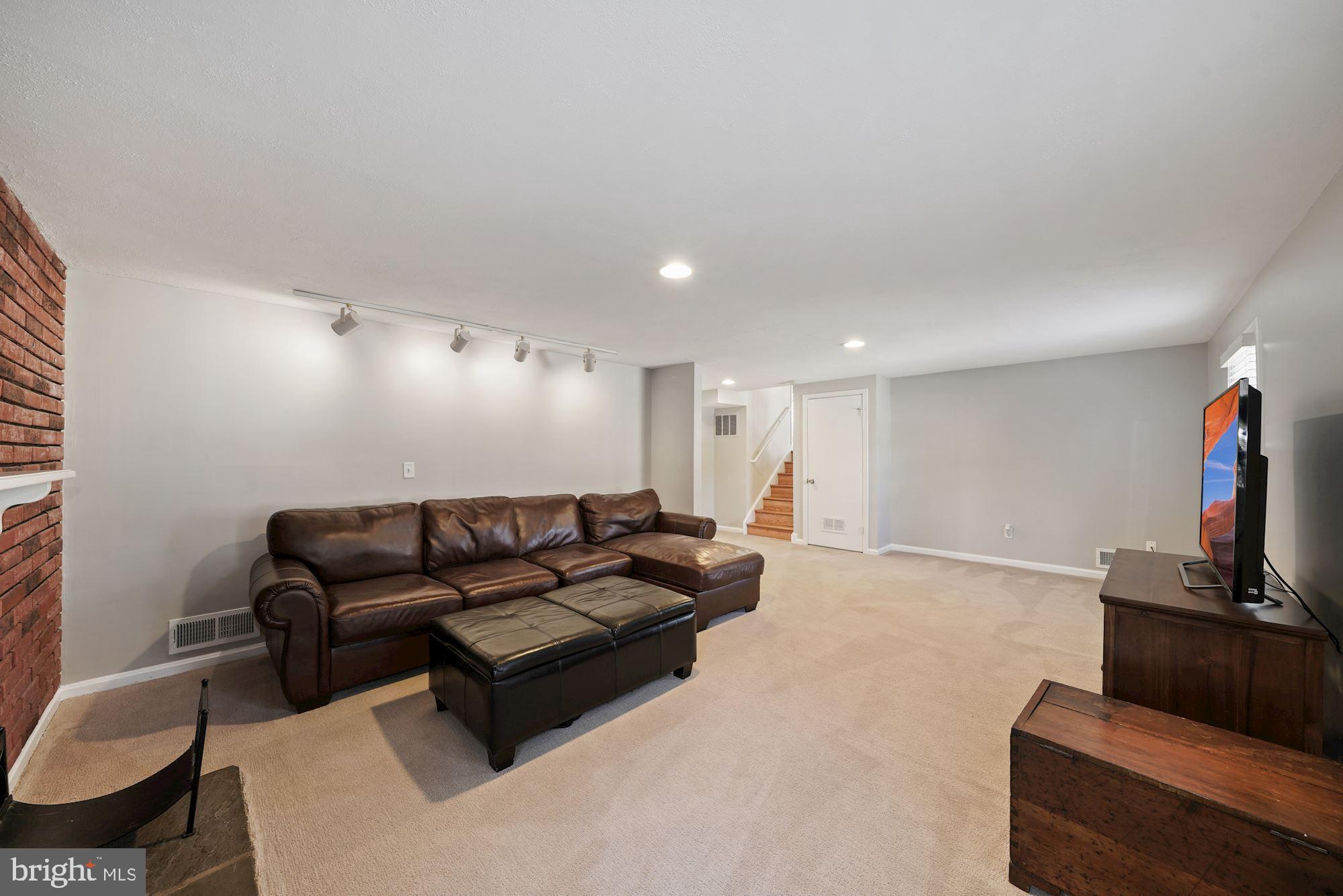 9709 Byeforde Road Kensington, MD 20895 - Photo 21 of 35 Carpeted Family Room