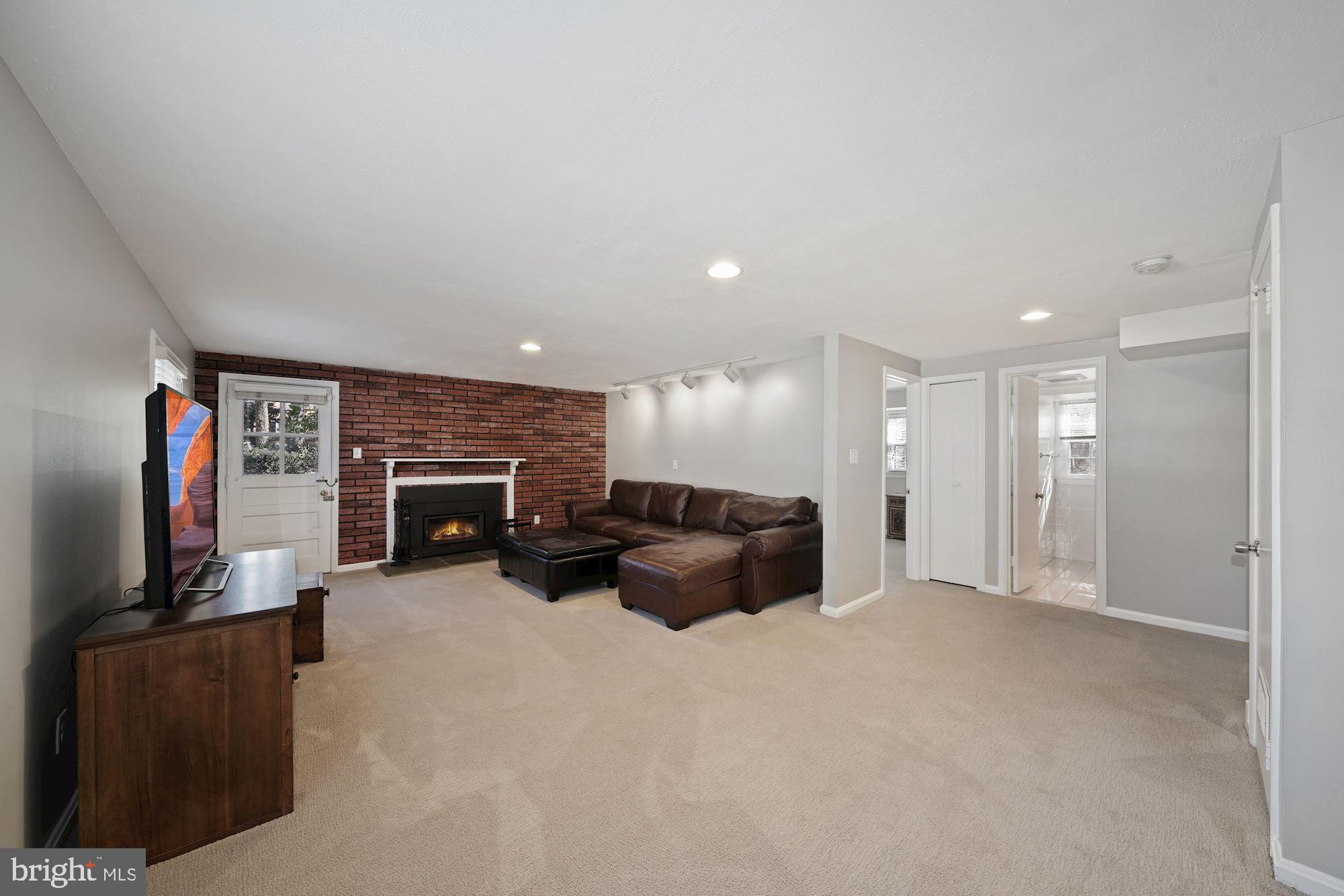 9709 Byeforde Road Kensington, MD 20895 - Photo 22 of 35 Significant Family Room with Fireplace/Insert