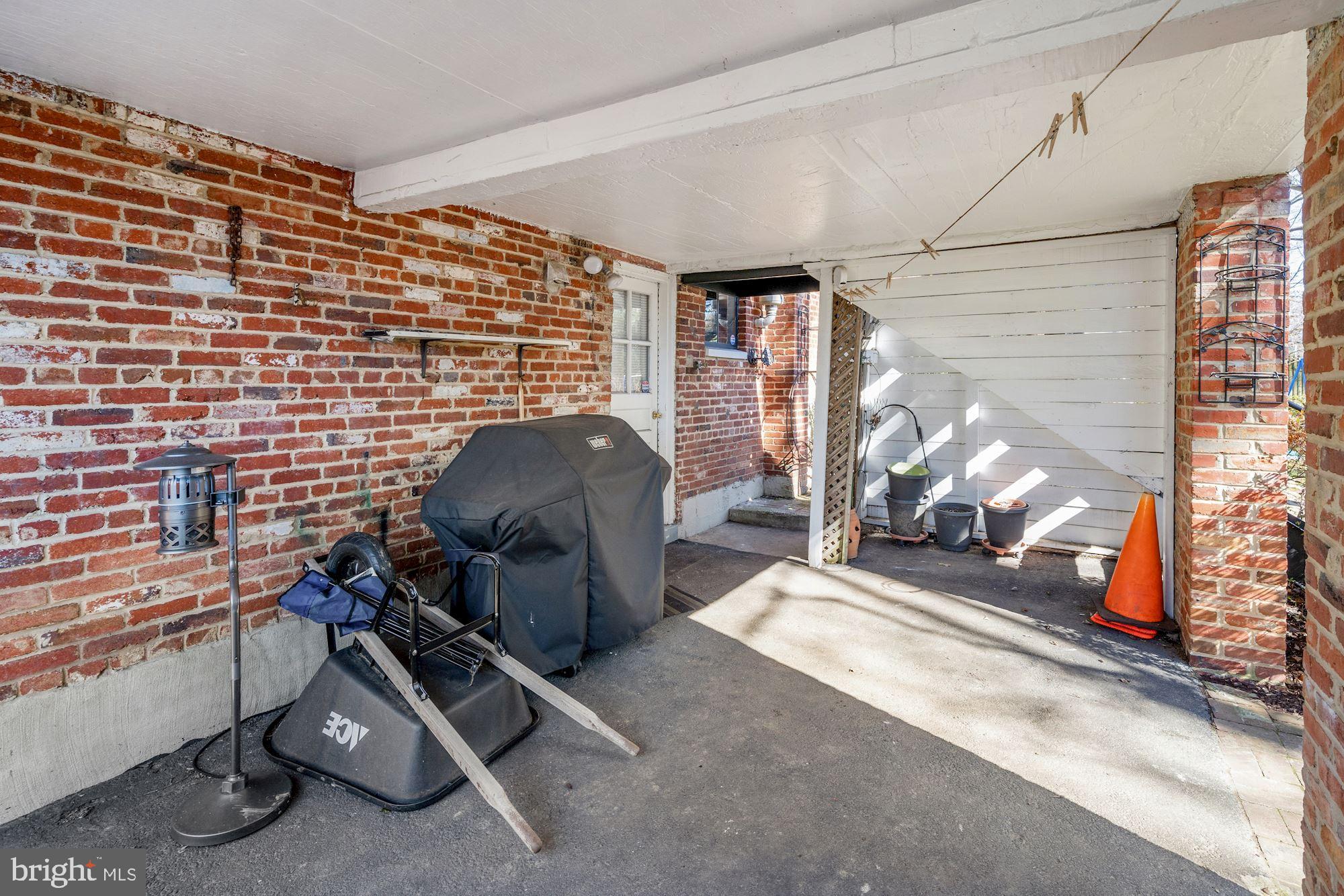 9709 Byeforde Road Kensington, MD 20895 - Photo 28 of 35 Rear Covered Carport, great for outdoor storage