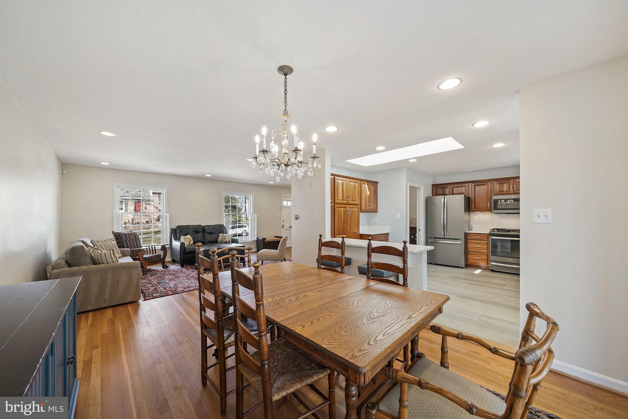 9709 Byeforde Road Kensington, MD 20895 - Photo 6 of 35 Dining Room opening to Kitchen Breakfast Bar