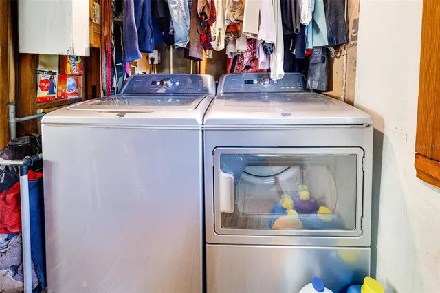 a utility room with dryer and washer