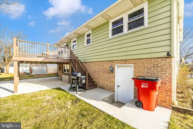 a view of a house with large windows