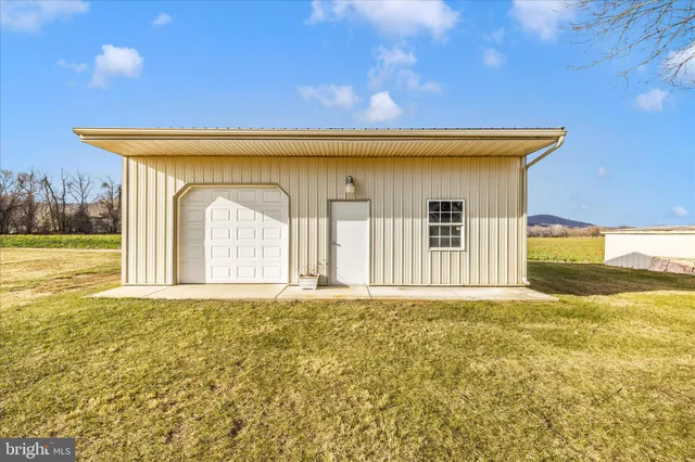 a view of a house with a garden