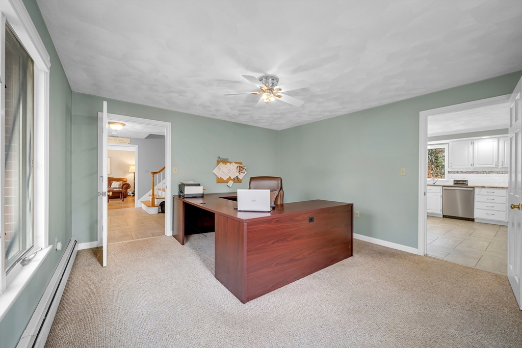 315 Candlestick Road North Andover, MA 01845 - Photo 38 of 42 a living room with furniture and a chandelier