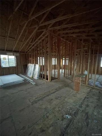 a view of a room with wooden walls
