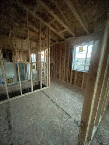 a view of an empty room with a glass door