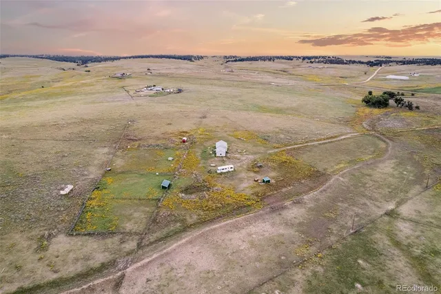 a view of a house with a ocean beach