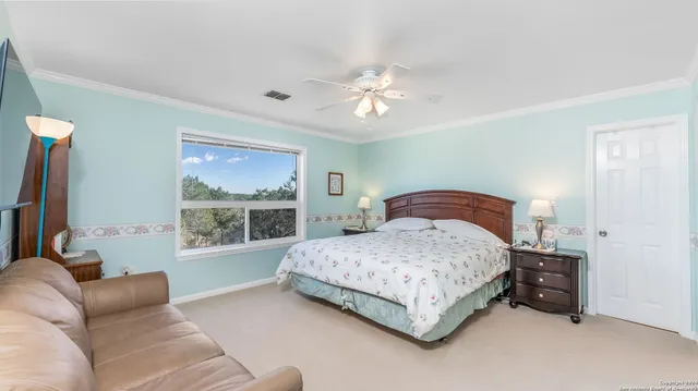 a open dining room with stainless steel appliances kitchen island granite countertop furniture and a kitchen view