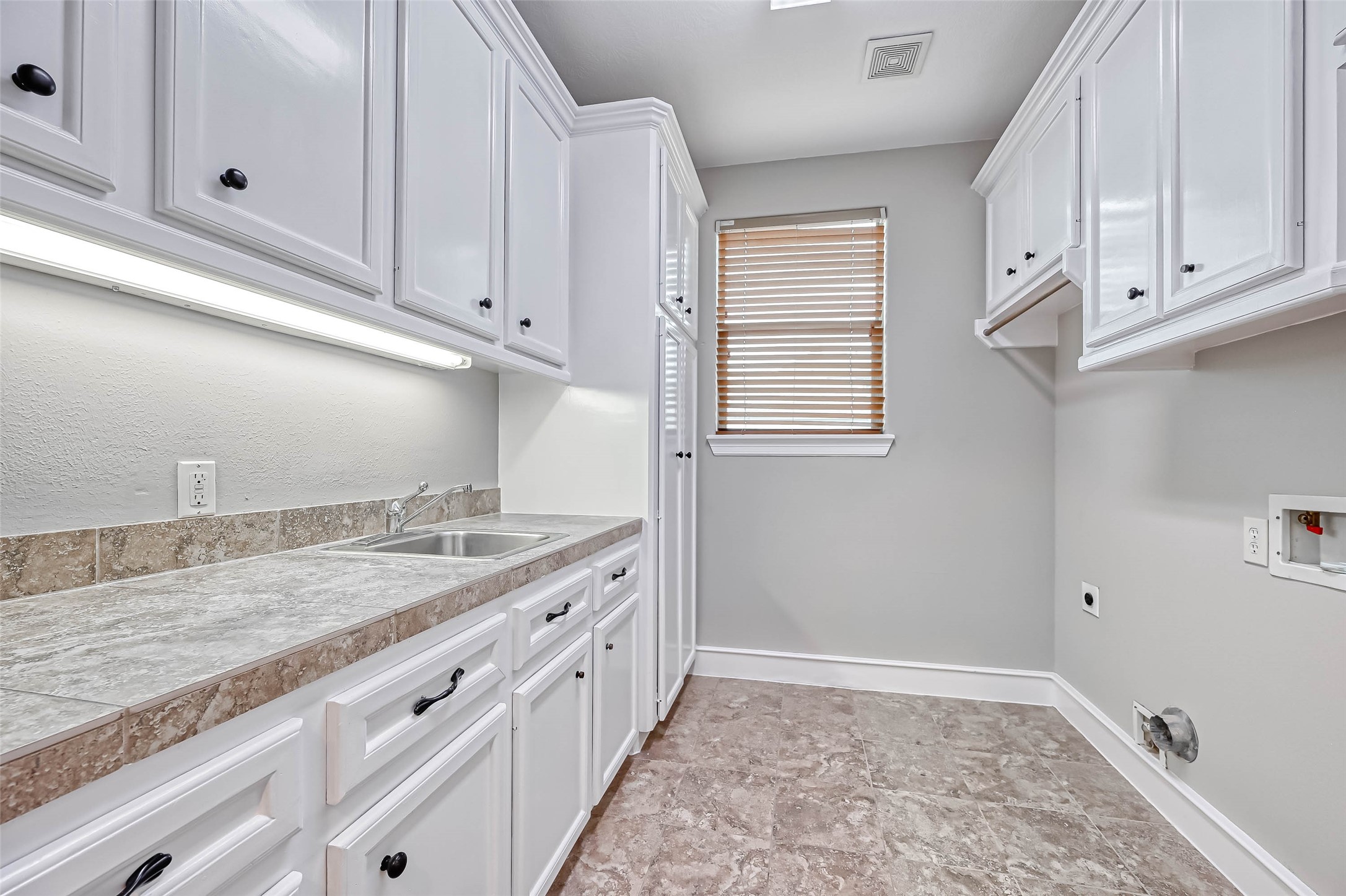 13815 Nathan Ridge Lane Cypress, TX 77429 - Photo 19 of 49 a view of a kitchen with granite countertop cabinets appliances a sink and dishwasher