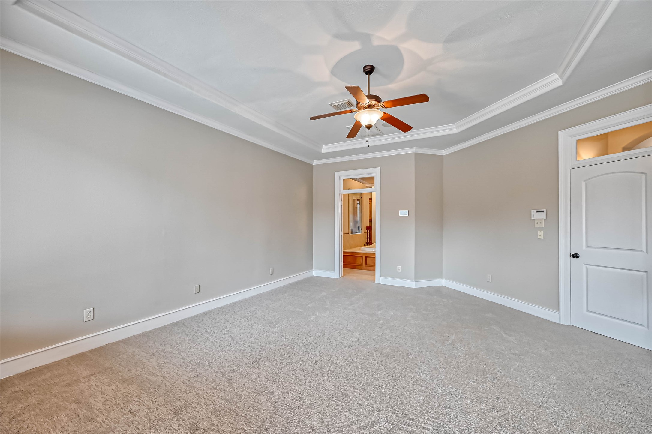 13815 Nathan Ridge Lane Cypress, TX 77429 - Photo 34 of 49 an empty room with window and a ceiling fan