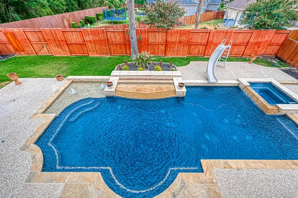 a view of yard with patio