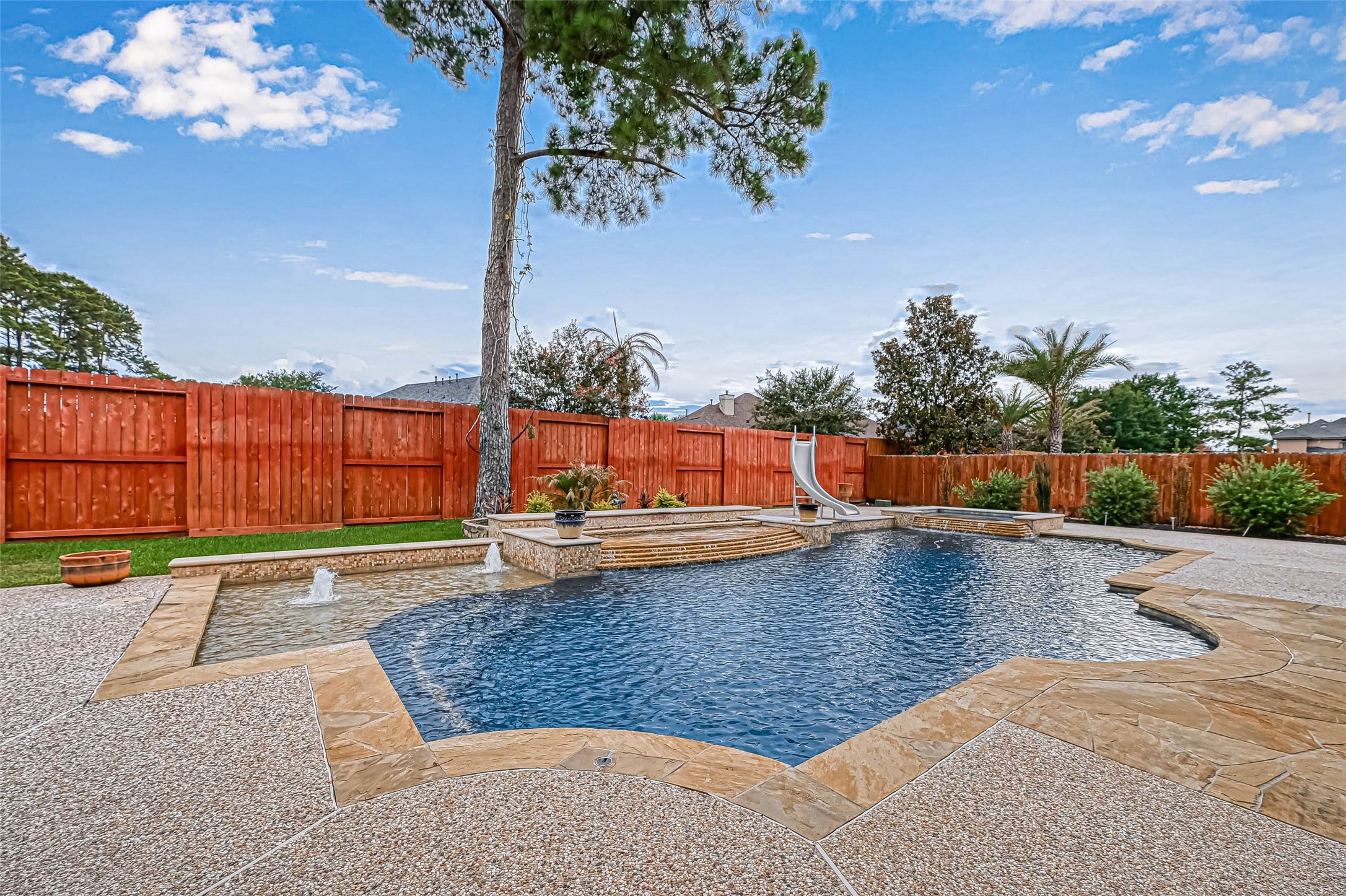 13815 Nathan Ridge Lane Cypress, TX 77429 - Photo 43 of 49 a view of a swimming pool with a lounge chair