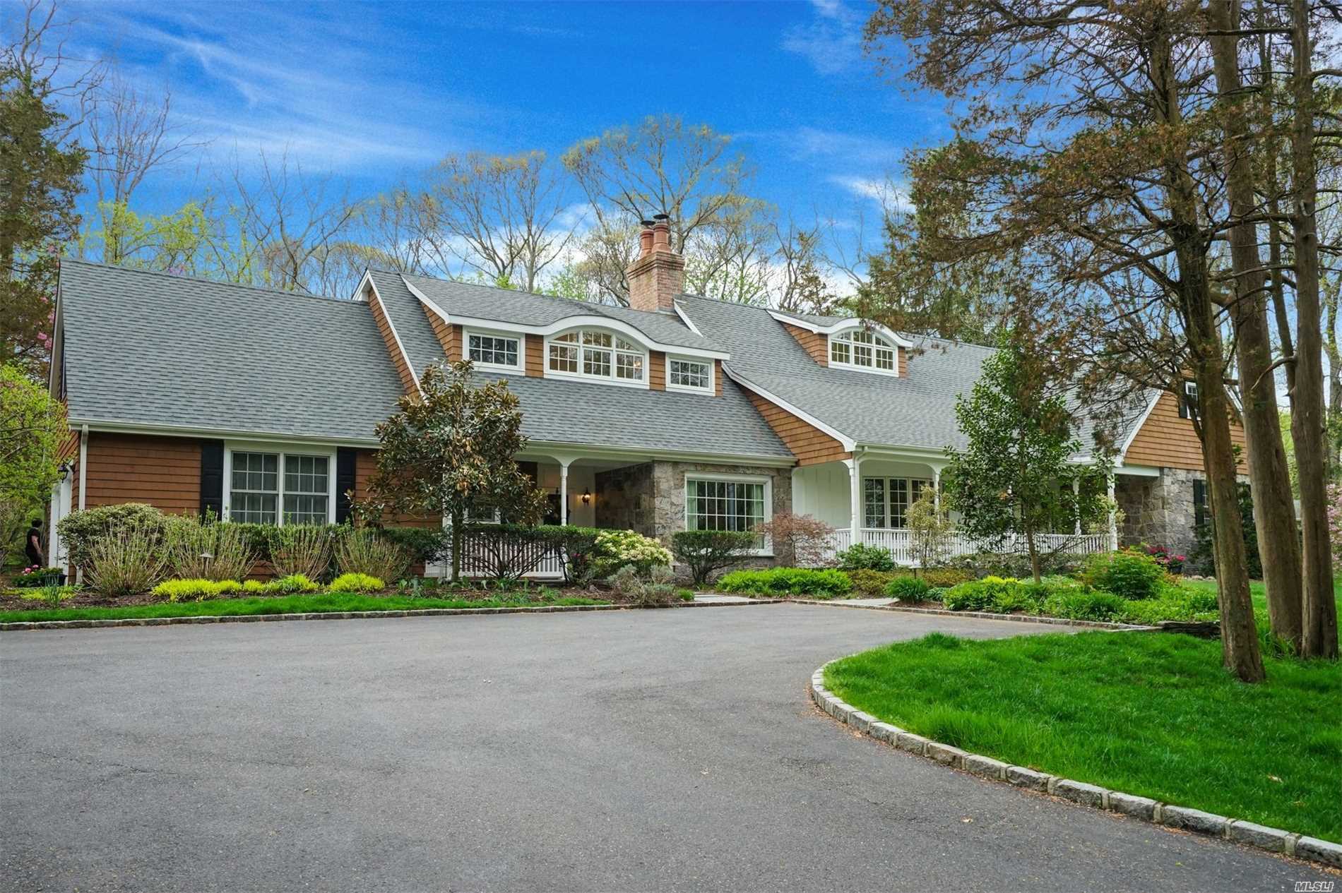 642 Moriches Road Nissequogue, NY 11780 - Photo 1 of 1 front view of a house with a yard