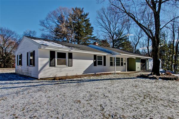 45 Gregory Road Framingham, MA 01701 - Photo 1 of 27 a front view of a house with garden