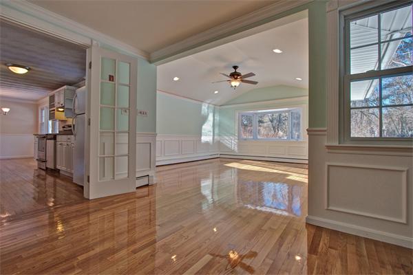 45 Gregory Road Framingham, MA 01701 - Photo 11 of 27 wooden floor in an empty room with a window