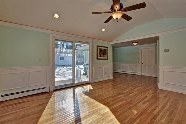 45 Gregory Road Framingham, MA 01701 - Photo 14 of 27 a view of empty room with wooden floor and fan