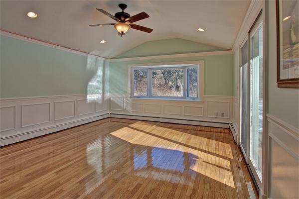 45 Gregory Road Framingham, MA 01701 - Photo 15 of 27 a view of empty room with wooden floor and fan