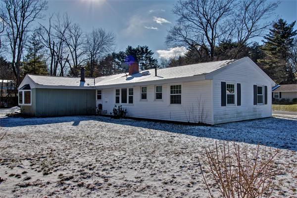 45 Gregory Road Framingham, MA 01701 - Photo 24 of 27 a front view of a house with a garden