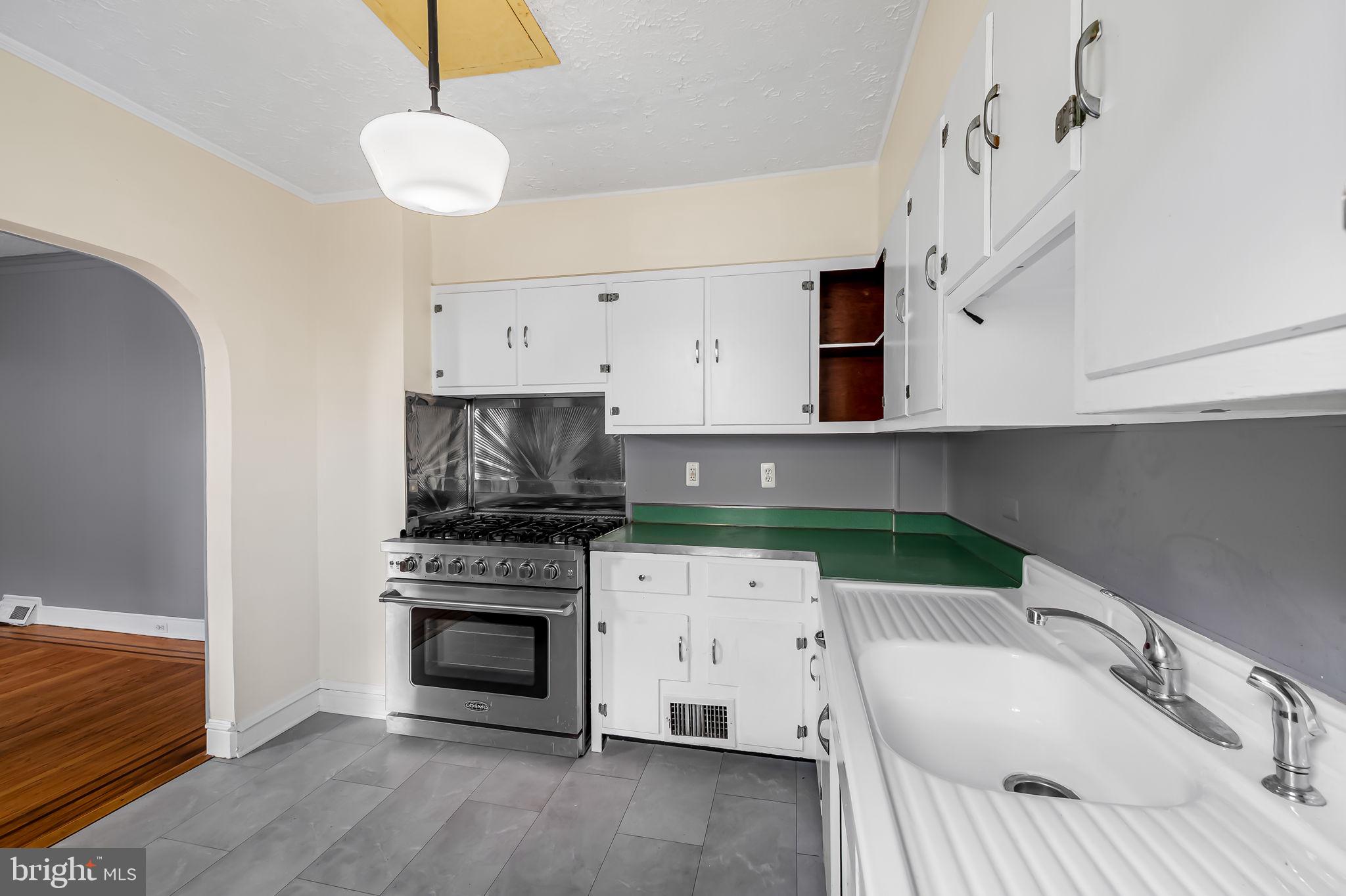 304 West Cold Spring Lane Baltimore, MD 21210 - Photo 14 of 34 Charming kitchen with vintage flair.