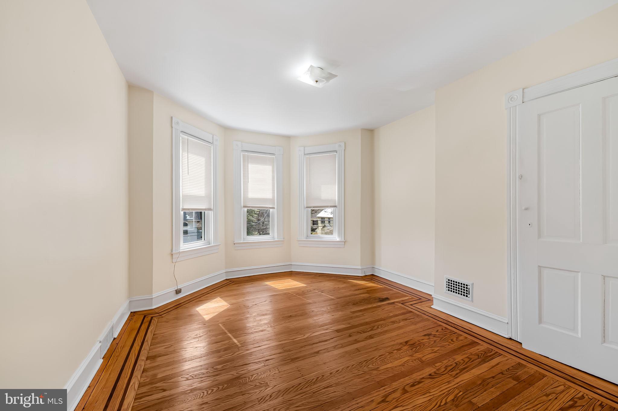 304 West Cold Spring Lane Baltimore, MD 21210 - Photo 18 of 34 Bright, airy corner room with charm.
