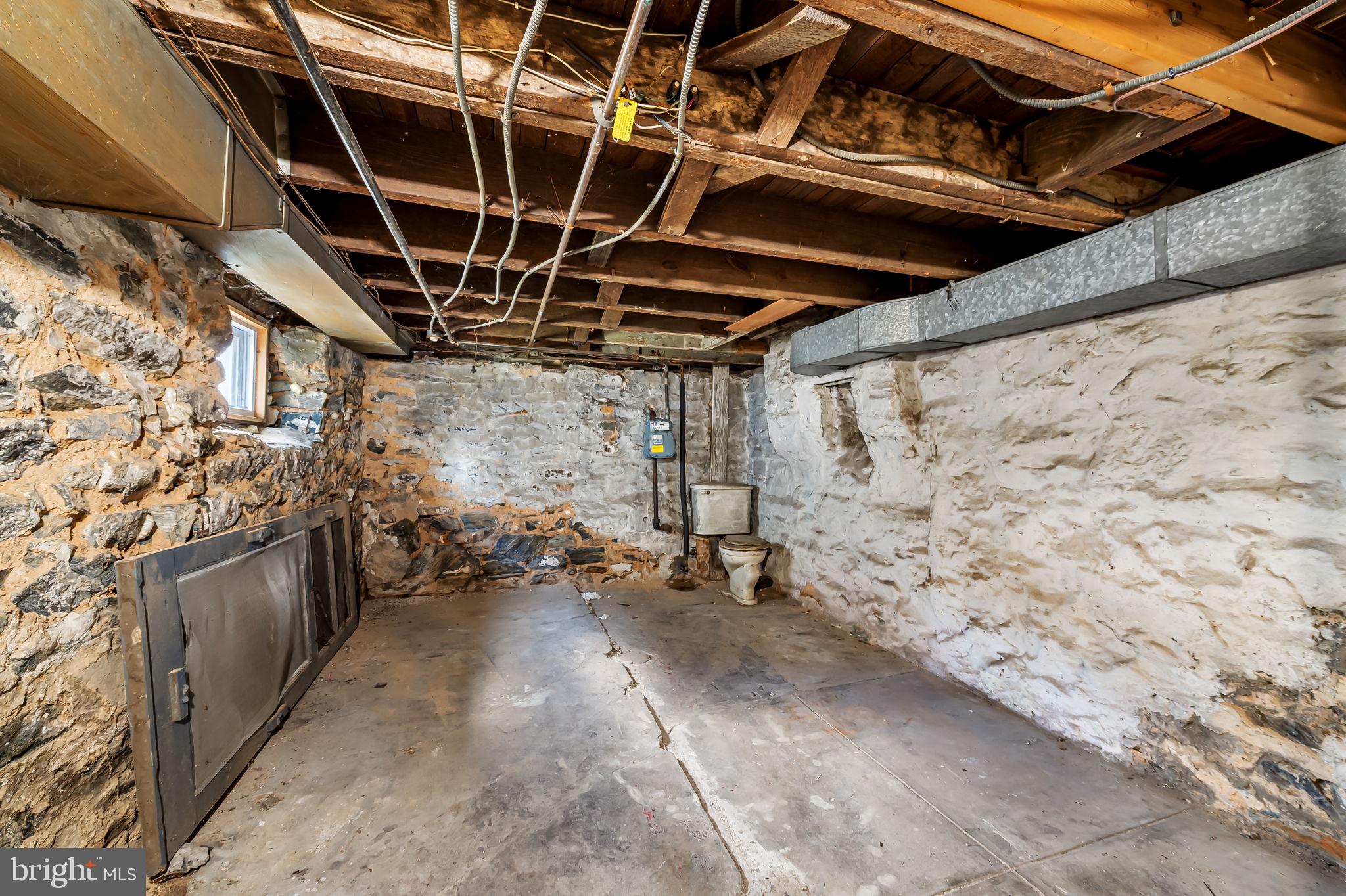 304 West Cold Spring Lane Baltimore, MD 21210 - Photo 27 of 34 Spacious unfinished basement with potential.