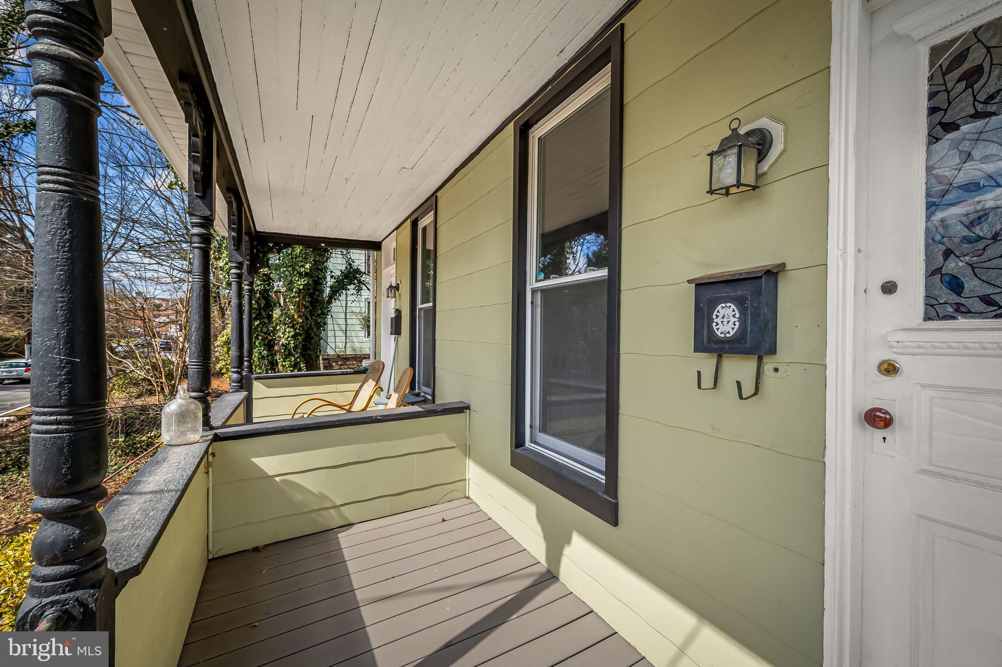 304 West Cold Spring Lane Baltimore, MD 21210 - Photo 3 of 34 Charming porch with inviting details.