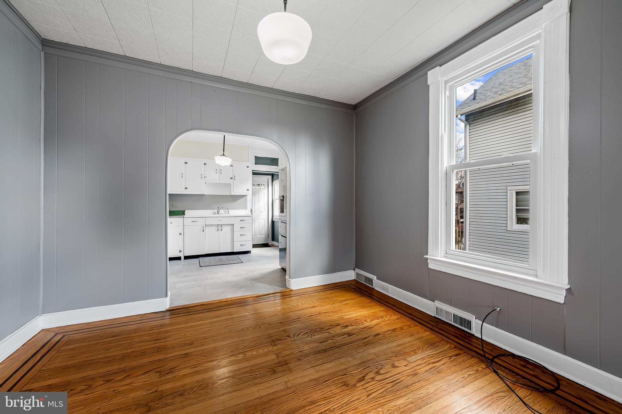 304 West Cold Spring Lane Baltimore, MD 21210 - Photo 9 of 34 Bright, airy space with classic charm.