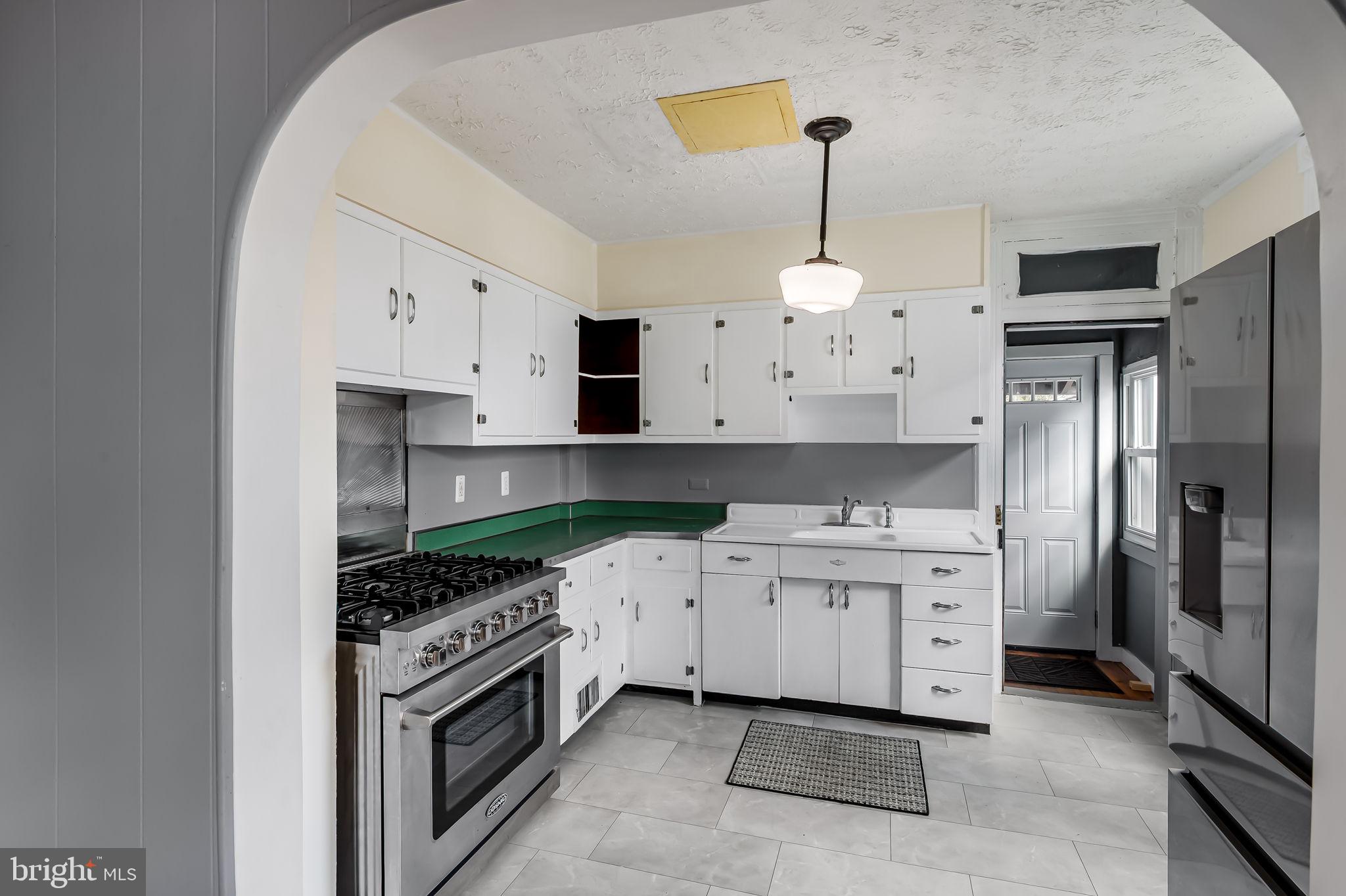 304 West Cold Spring Lane Baltimore, MD 21210 - Photo 10 of 34 Charming kitchen with vintage flair.