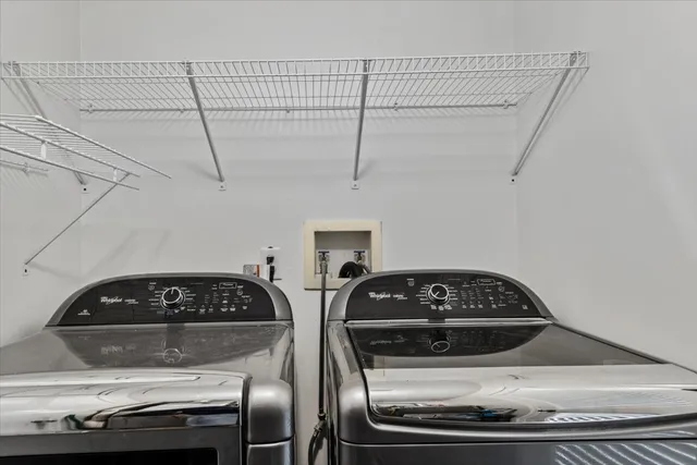 a stove top oven sitting inside of a kitchen