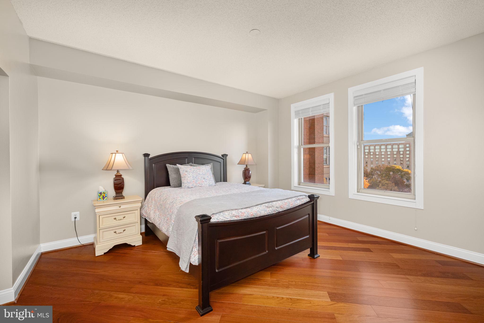 11776 Stratford House Place, Unit 907 Reston, VA 20190 - Photo 18 of 38 a bedroom with a bed and window