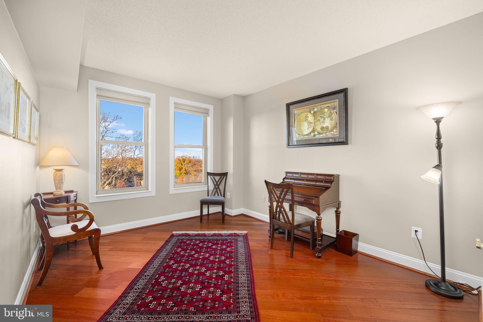 11776 Stratford House Place, Unit 907 Reston, VA 20190 - Photo 24 of 38 a bedroom with furniture and a window