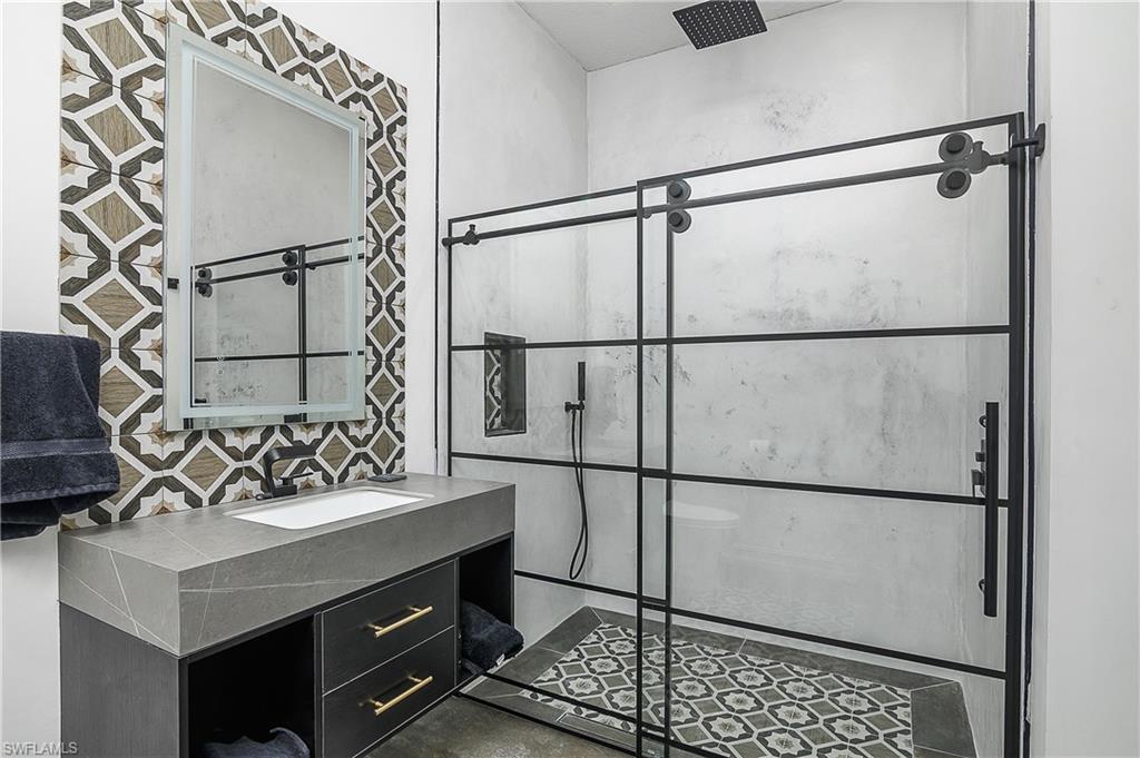 9489 Italia Way Naples, FL 34113 - Photo 22 of 50 a view of a walk in closet