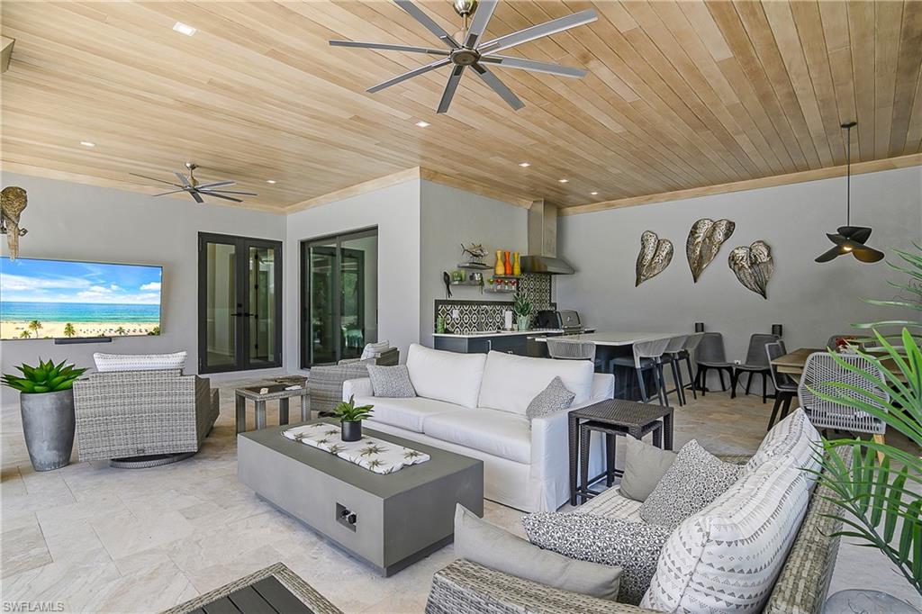 9489 Italia Way Naples, FL 34113 - Photo 29 of 50 a living room with furniture