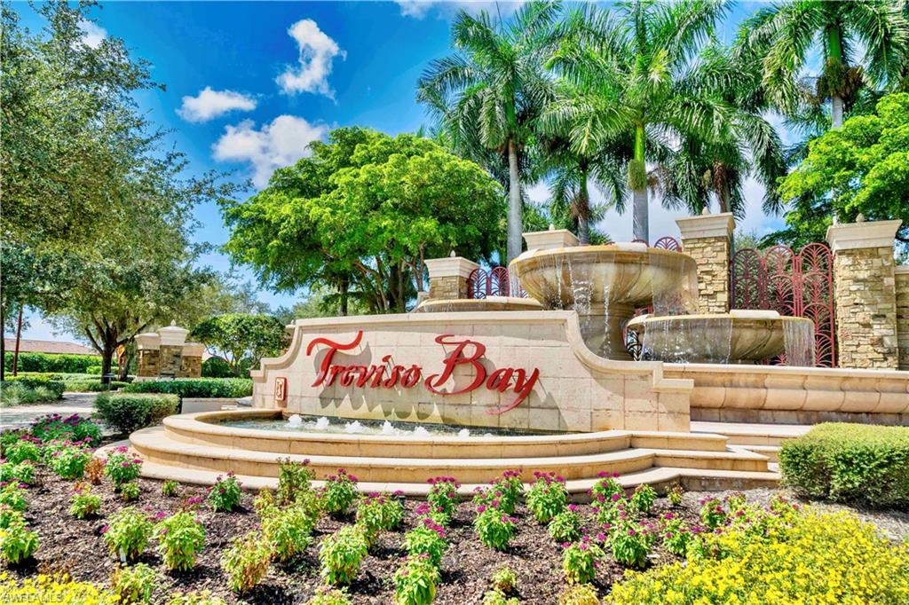 9489 Italia Way Naples, FL 34113 - Photo 36 of 50 a view of outdoor space with garden and entertaining space