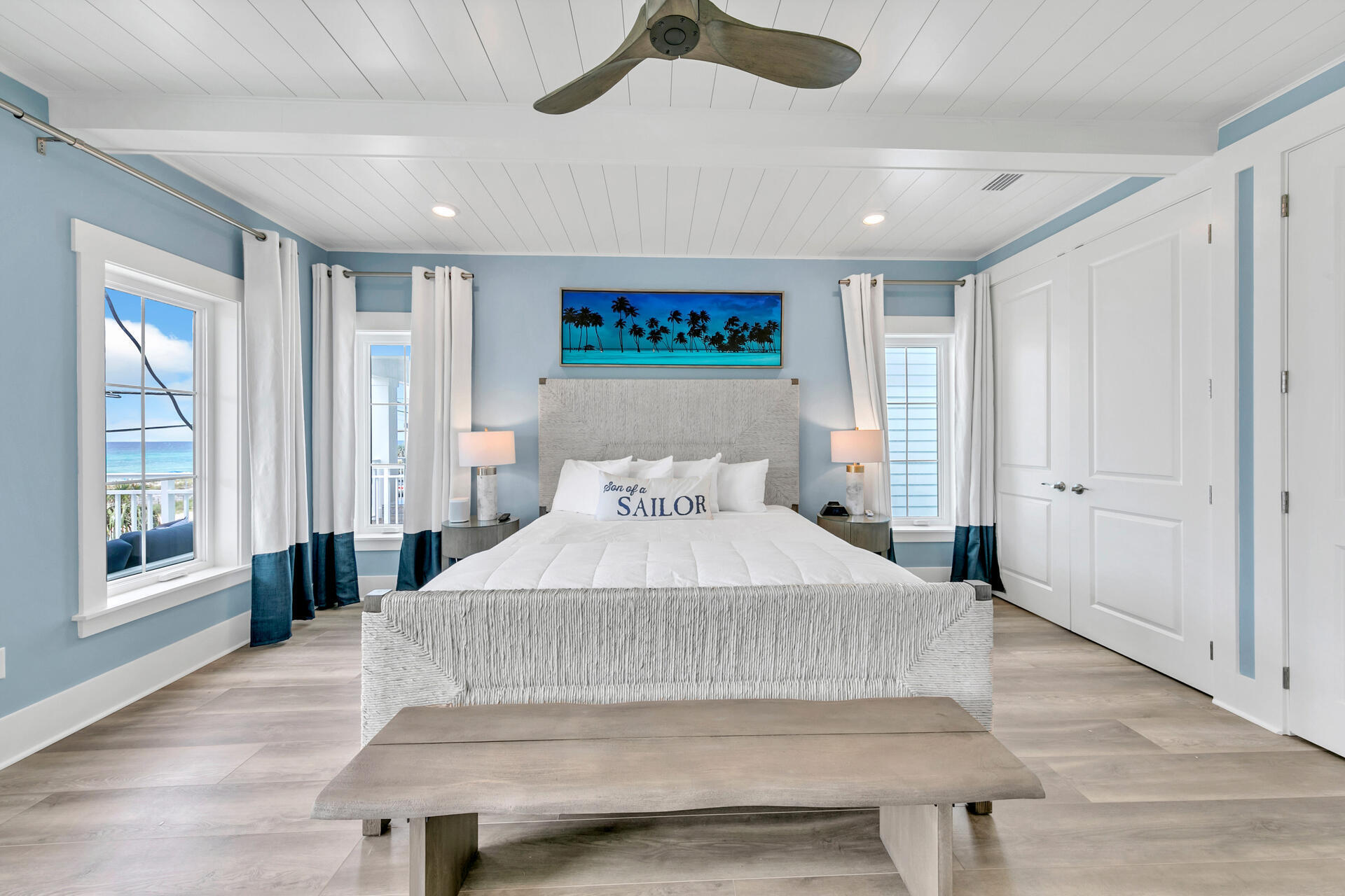 13662 Front Beach Road Panama City Beach, FL 32413 - Photo 20 of 46 a bedroom with a large bed and a window