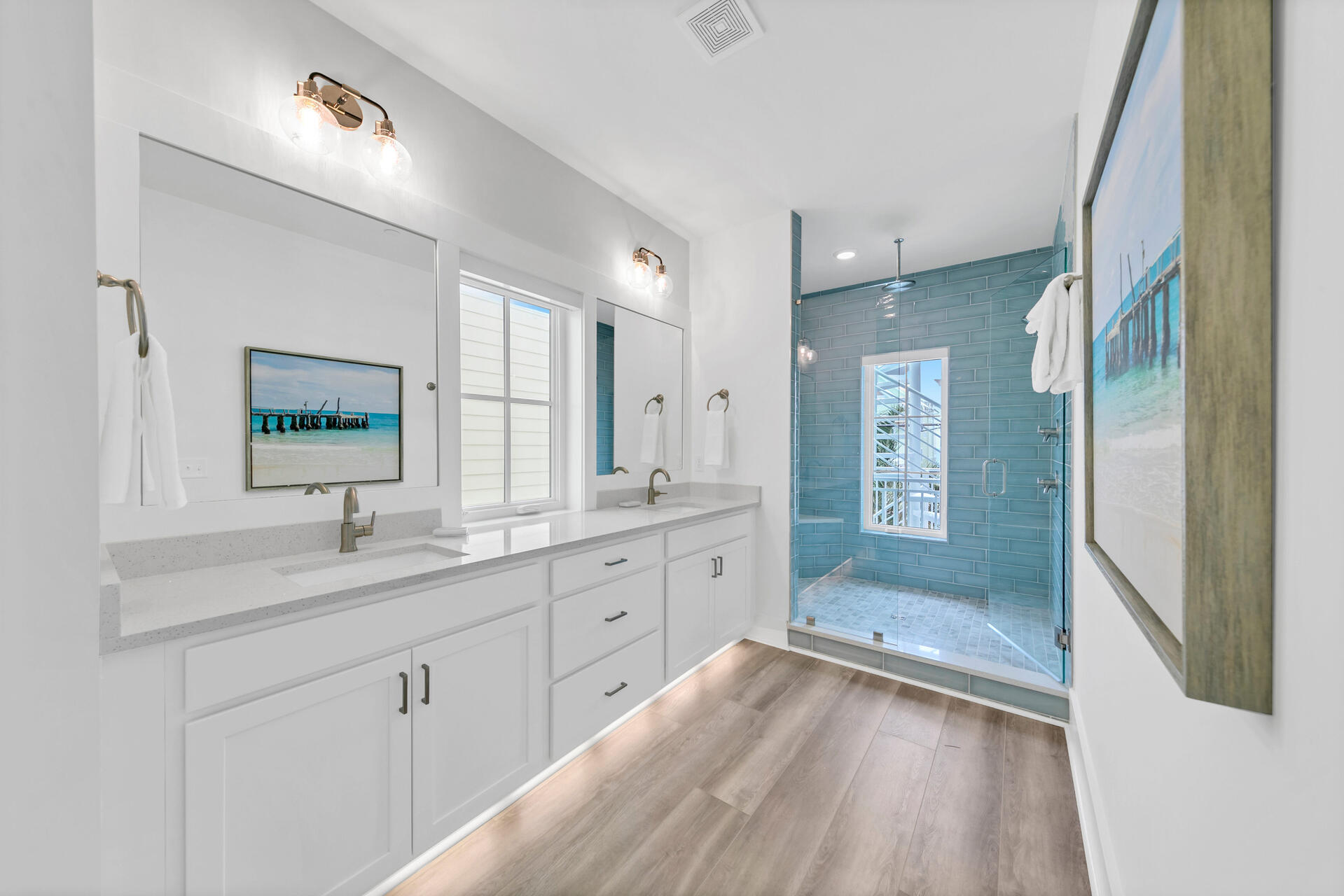 13662 Front Beach Road Panama City Beach, FL 32413 - Photo 22 of 46 a bathroom with a granite countertop sink mirror and shower