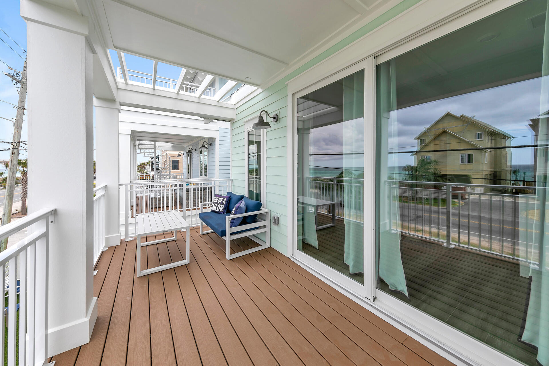 13662 Front Beach Road Panama City Beach, FL 32413 - Photo 25 of 46 a view of a balcony with wooden floor